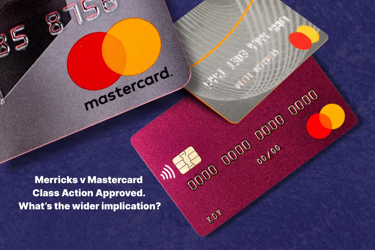 A dark blue background with images of three mastercard cards falling down. The caption reads 'Merricks v Mastercard Class Action Approved. What's the wider implication?'